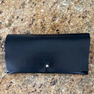 Rag & Bone black leather(?) glasses case. Embossed logo.